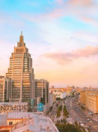 High angle view of buildings against sky during sunset