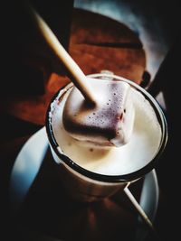 High angle view of coffee cup on table