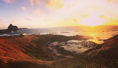 Scenic view of sea against sky during sunset