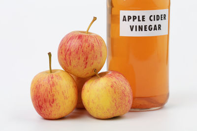Close-up of apple against white background