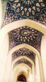 Low angle view of ornate ceiling