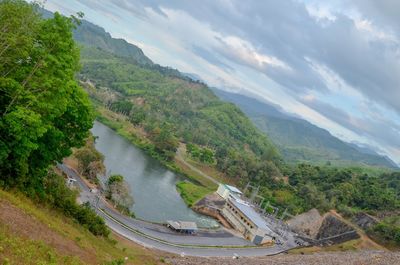 High angle view of road by mountain against sky