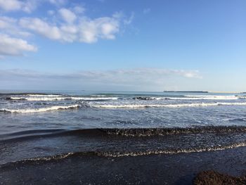 Scenic view of beach against sky