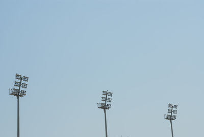 Low angle view of floodlight against clear sky