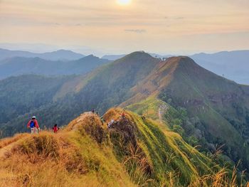 Scenic view of mountains against sky during sunset