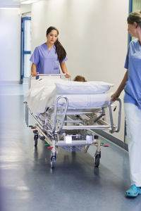 Nurses walking through corridor