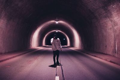 People walking in tunnel