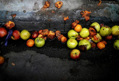 Close-up of apples on wood