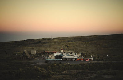 Scenic view of landscape against sky during sunset