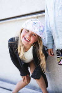 Smiling girl wearing hat