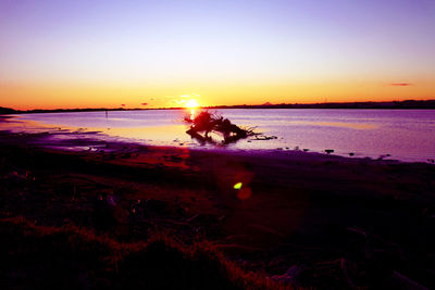 Scenic view of sunset over sea