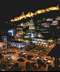 High angle view of illuminated city at night