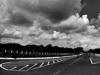 Road against cloudy sky