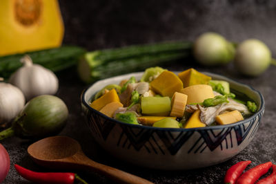 High angle view of fruits in bowl on table