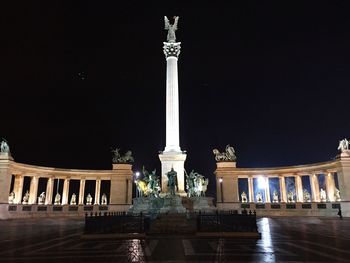 Low angle view of monument at night