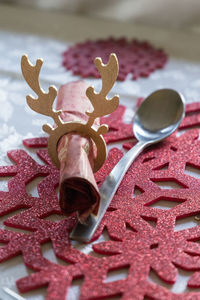 Close-up of red chili peppers on table