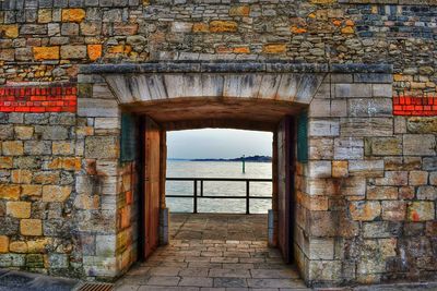 Brick wall with closed door