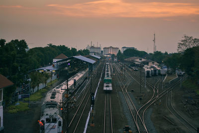 High angle view of railroad tracks against sky during sunset