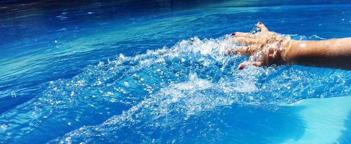 Woman swimming in sea