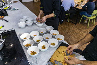 High angle view of people preparing food