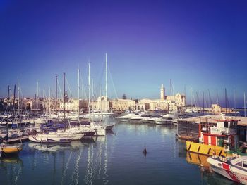 Boats moored in harbor