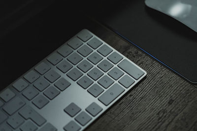 High angle view of computer keyboard on table