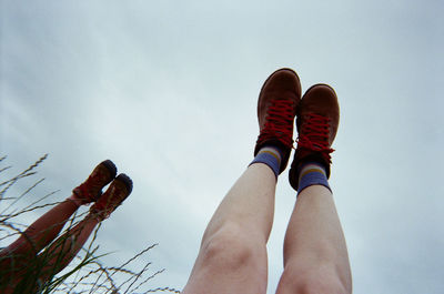 Low section of woman standing on floor