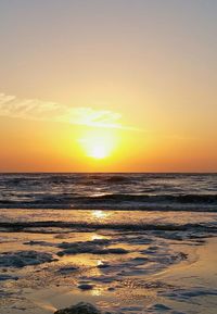 Scenic view of sea at sunset