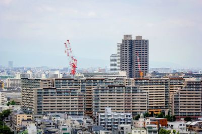 Modern buildings in city against sky