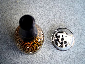 High angle view of bottles on table