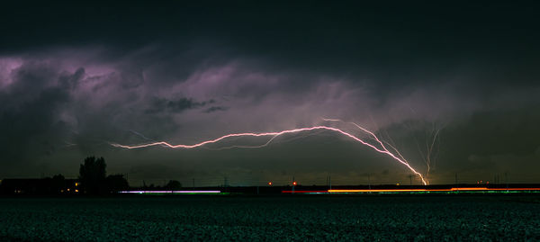 Lightning shooting upwards from an off shore windpark in the north sea.