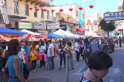 People at market stall