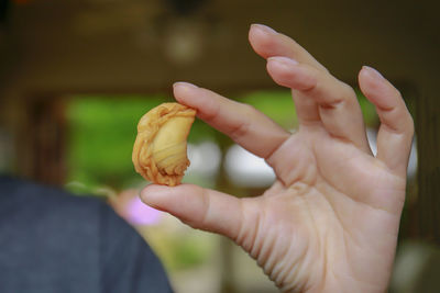 Close-up of person holding ice cream