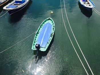 High angle view of boats moored on lake