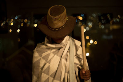 Rear view of man wearing hat