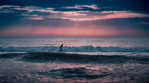 Scenic view of sea against sky during sunset
