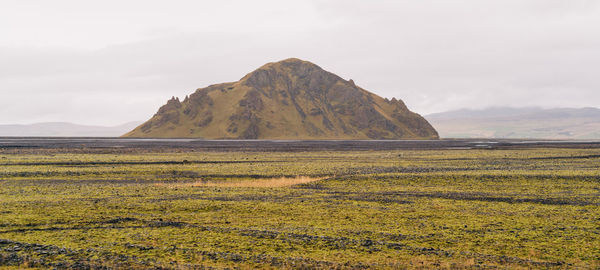 Scenic view of rocky mountains against sky