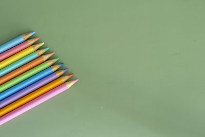 High angle view of colored pencils on table