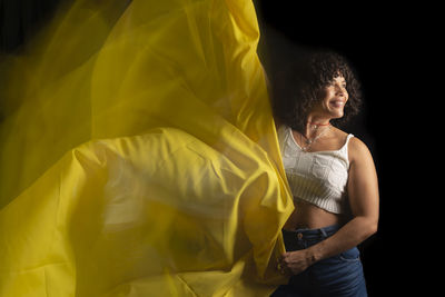Time lapse view of woman moving a rag. long exposure, motion blur. 