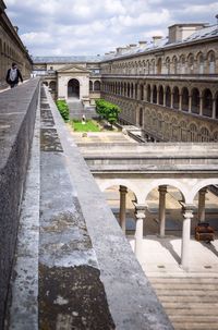 View of historical building against cloudy sky