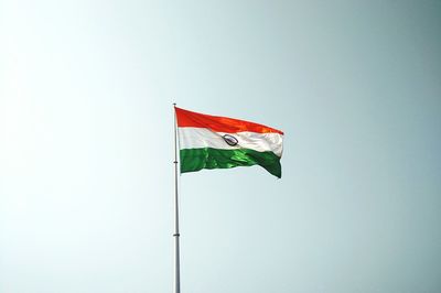 Low angle view of the flag of india against clear sky