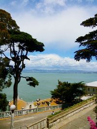 Scenic view of sea against cloudy sky