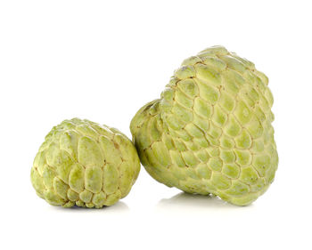 Close-up of fruits against white background