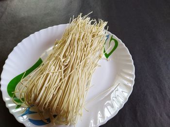 High angle view of rice in plate on table