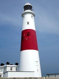 Low angle view of lighthouse against sky during sunny day