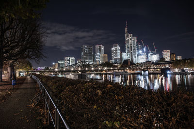 Illuminated buildings in city at night