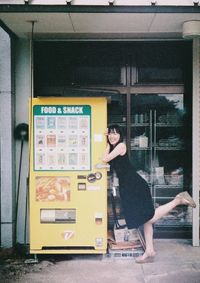 Woman standing in front of door