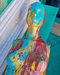 High angle view of multi colored water on wood