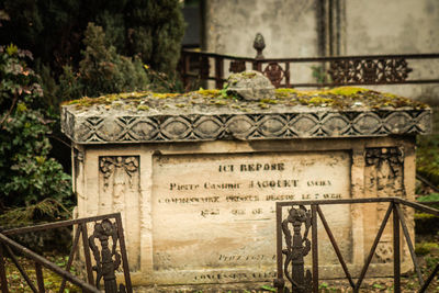 Text on stone at cemetery