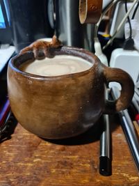 Close-up of coffee cup on table